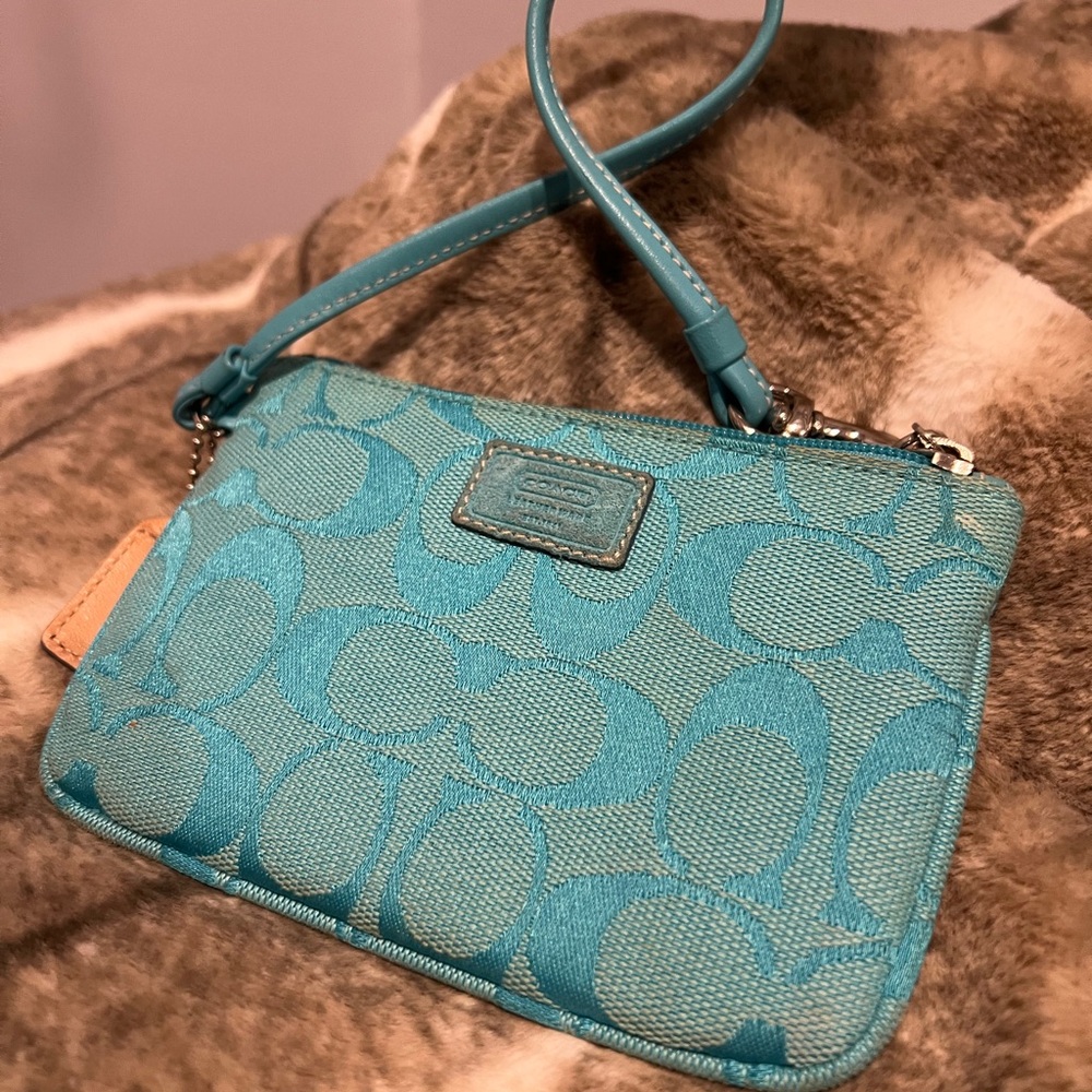 COACH light blue wristlet